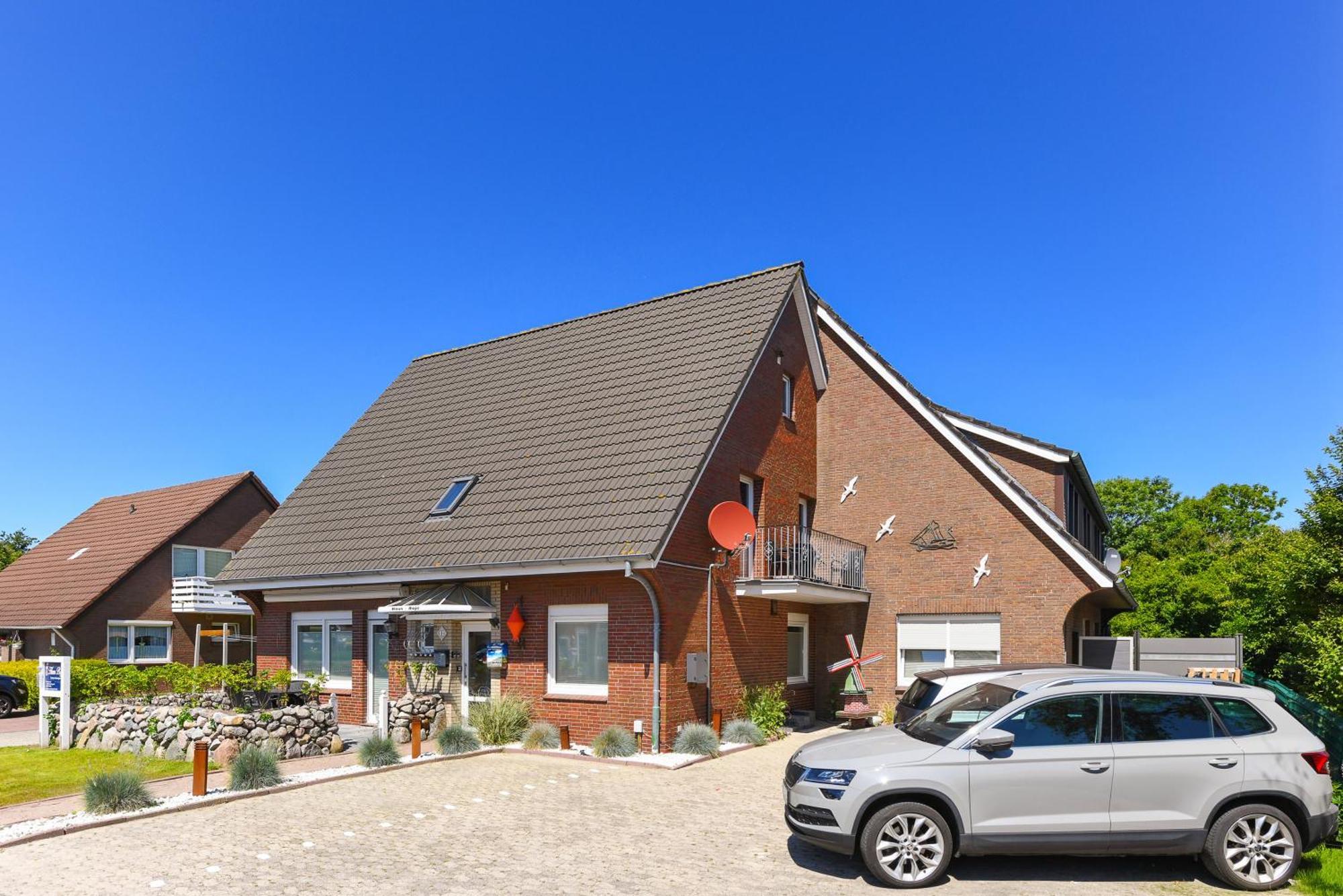 Ferienwohnungen Haus Boje Krabbe Neuharlingersiel Exterior foto